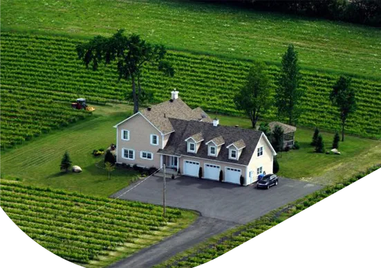 Propriété résidentielle en zone agricole avec terrain cultivé